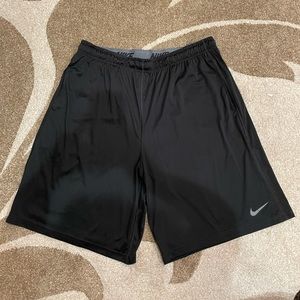 TWO PAIRS of BLACK NIKE DRI FIT SHORTS